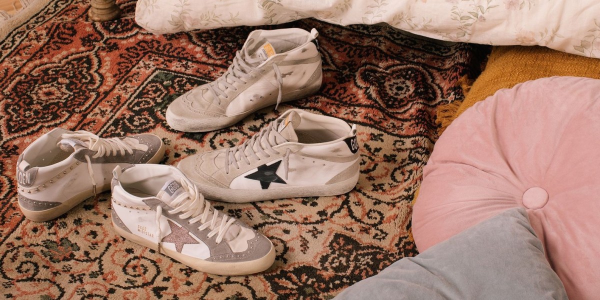 Golden Goose denim wrap with a pair of sport kicks
