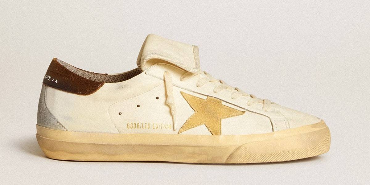 logo as opposed to Golden Goose loud repeat prints and